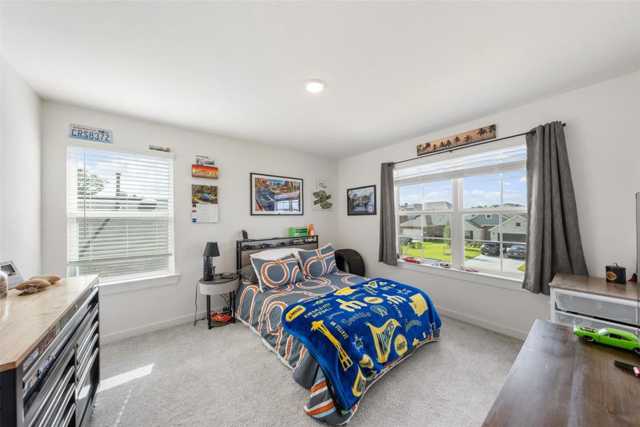 Furnished interior view inside a new home in Pinewood at Grand Texas, New Caney (Image 14).
