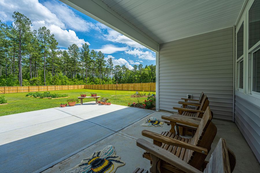 Exterior details and patio area of a home in French Quarter Creek, Huger (Image 3).