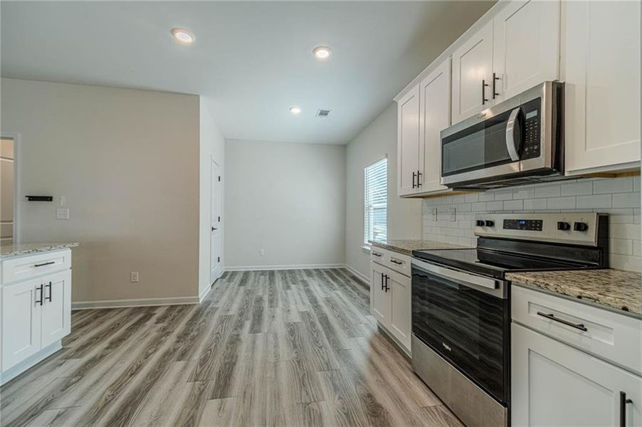 Furnished interior view inside a new home in , Dacula (Image 9).