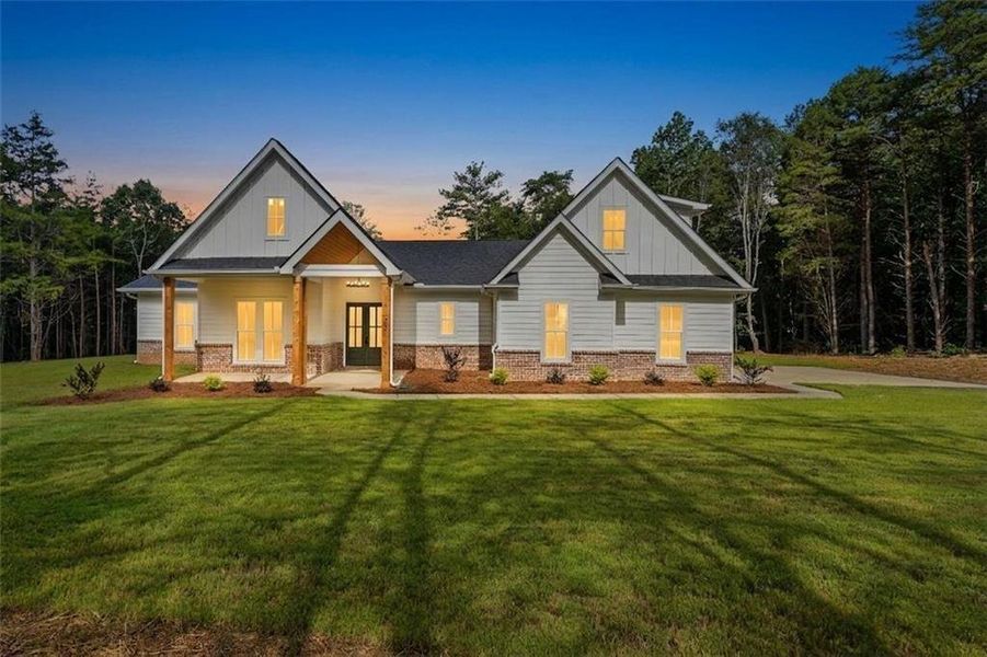Front exterior of a new home in , White, GA, highlighting curb appeal (Image 29). Front exterior of a new home in , White, GA, highlighting curb appeal (Image 29).