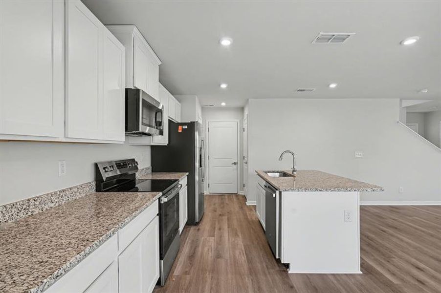 Furnished interior view inside a new home in Sterling Oaks, Ash (Image 5). Furnished interior view inside a new home in Sterling Oaks, Ash (Image 5).