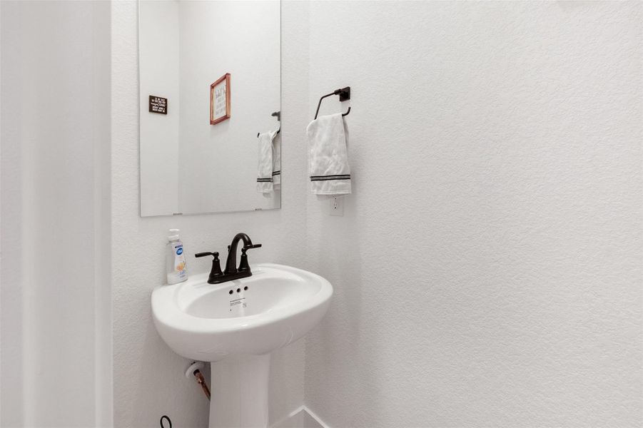 The 1/2 bath is downstairs for easy access for you and guests. The 1/2 bath is downstairs for easy access for you and guests.