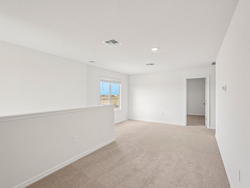 Spacious, unfurnished interior of a new home in Coasterra - Premier Series, Palmetto (Image 11).