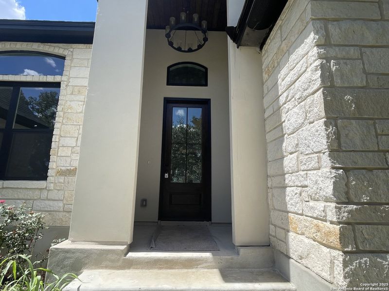 Exterior details and patio area of a home in , Castroville (Image 2).