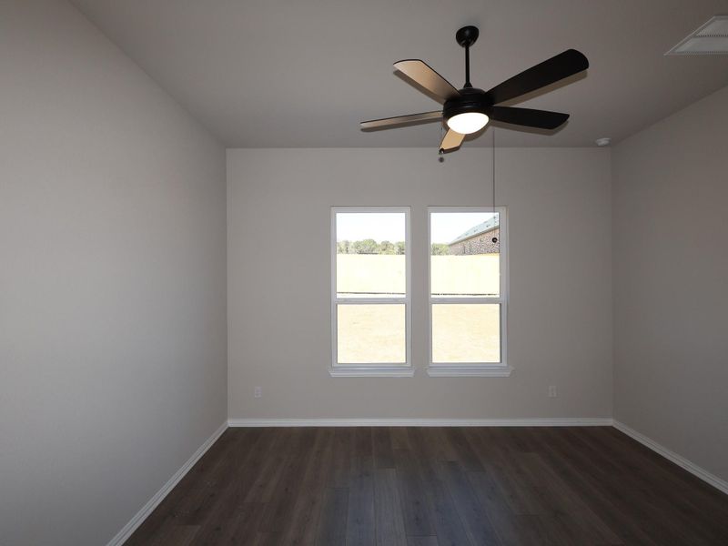Spacious, unfurnished interior of a new home in Heritage, Dripping Springs (Image 29).