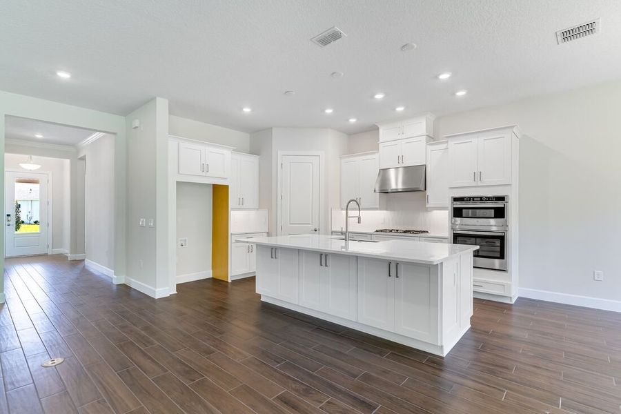 Representative furnished interior of a home built from the Letizia by Taylor Morrison in Esplanade at Center Lake Ranch, St. Cloud (Image 6).