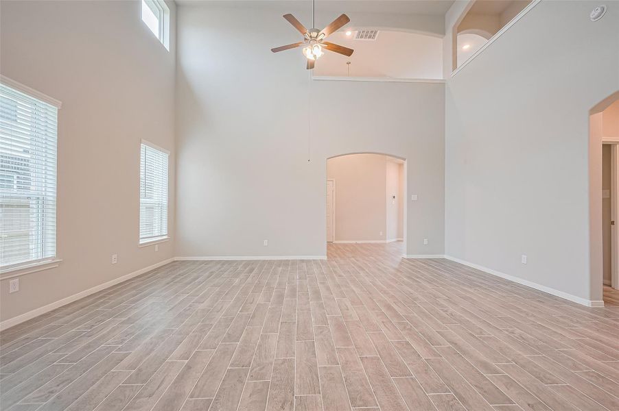 Spacious, unfurnished interior of a new home in Sunterra, Katy (Image 22).