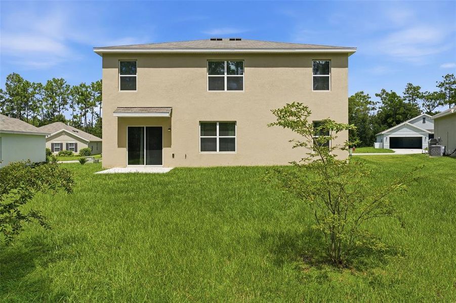 Exterior details and patio area of a home in Lake Diamond, Ocala (Image 29).