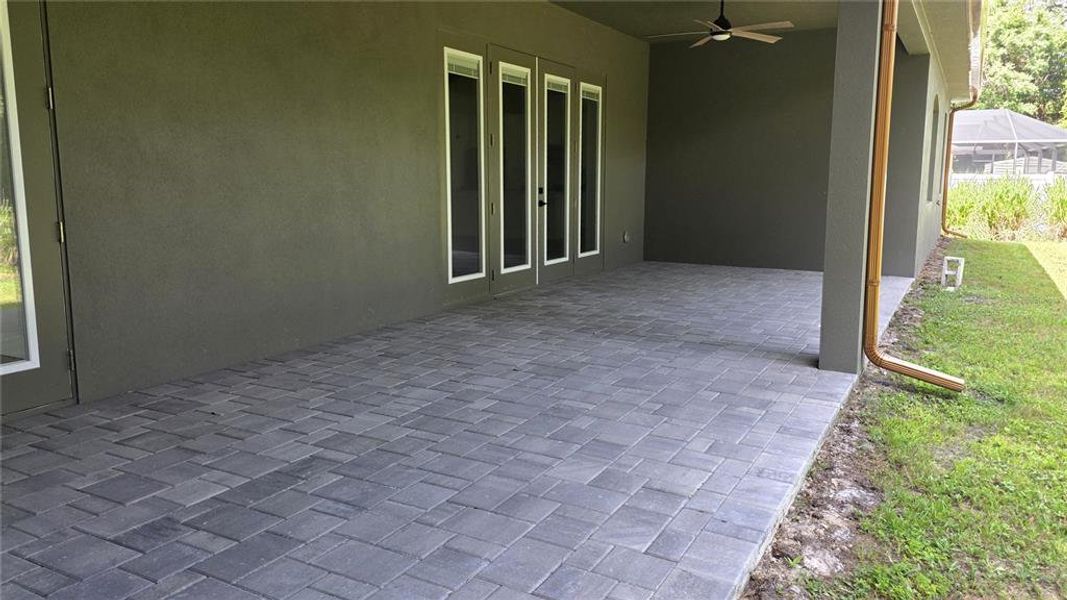 Exterior details and patio area of a home in , North Port (Image 35).