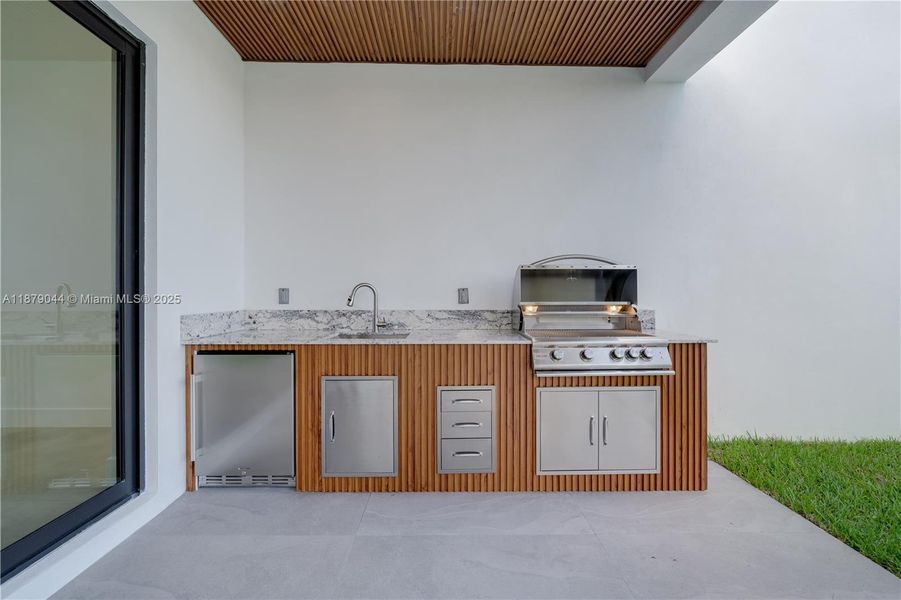 Exterior details and patio area of a home in , Miami (Image 25). Exterior details and patio area of a home in , Miami (Image 25).