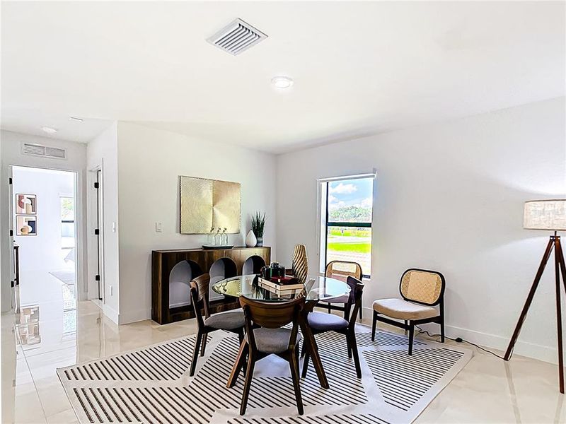 Furnished interior in a model home at On Lake Ella in Lady Lake (Image 4). Furnished interior in a model home at On Lake Ella in Lady Lake (Image 4).