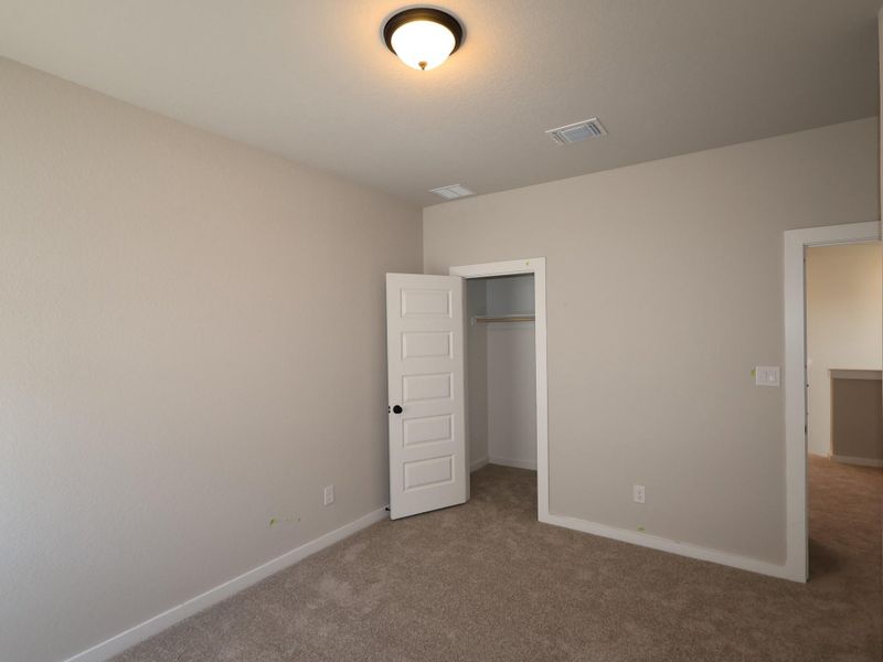 Spacious, unfurnished interior of a new home in Heritage, Dripping Springs (Image 11).