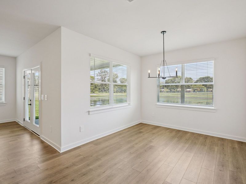 The open-concept floorplan allows for an easy flow between the kitchen and dining areas.