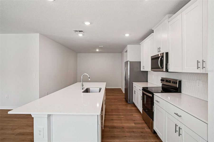 Furnished interior view inside a new home in Ridgehaven - Villas, Ormond Beach (Image 7).