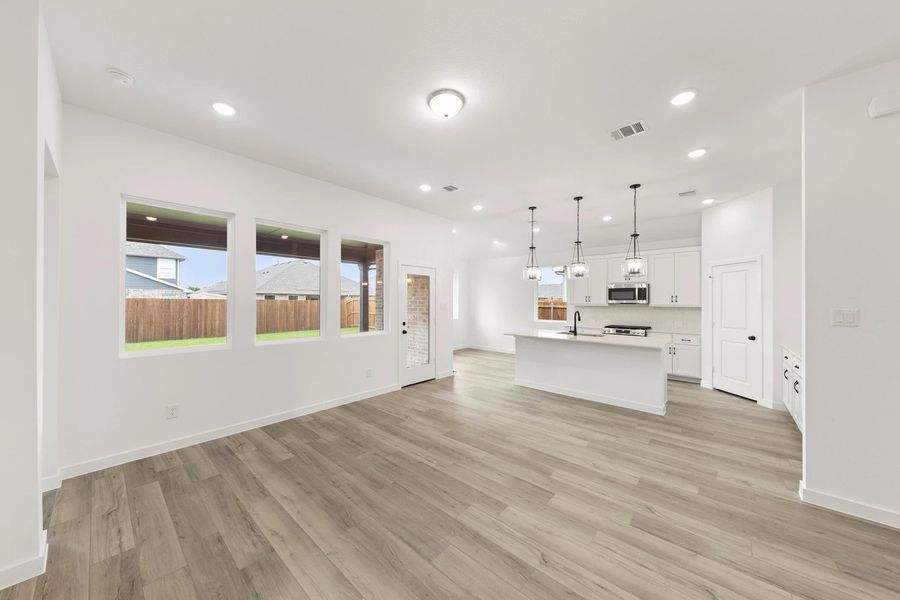 Open Kitchen-Living-Dining Room featuring the Harmony Collection