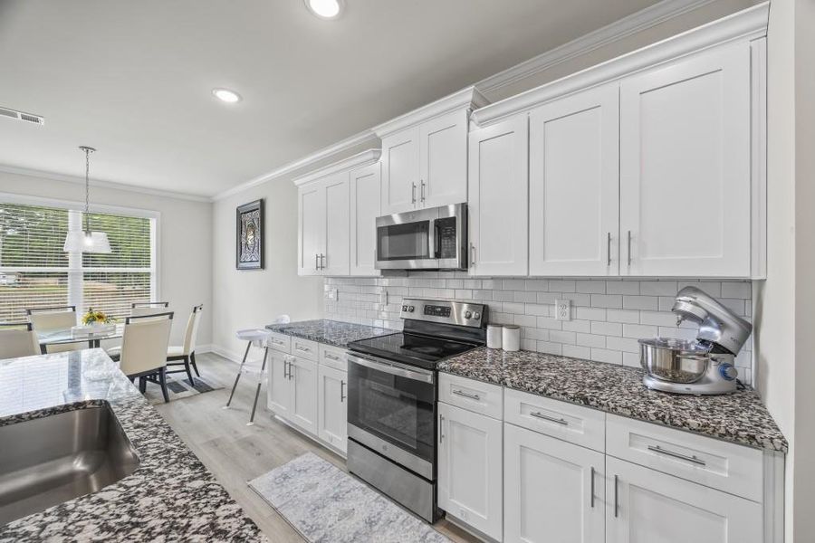 Furnished interior view inside a new home in , Winder (Image 13).
