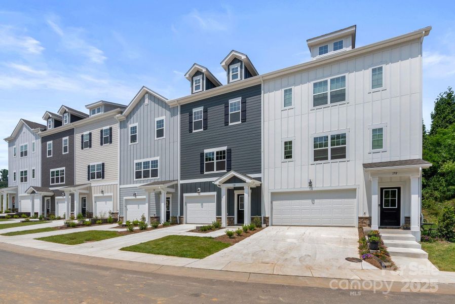 Front exterior of a new home in , Asheville, NC, highlighting curb appeal (Image 1).