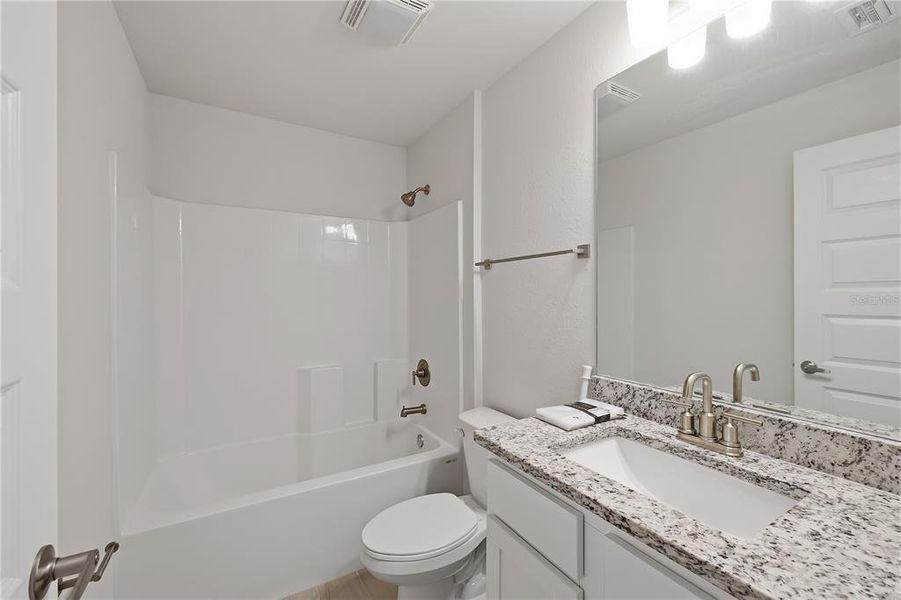 Furnished interior view inside a new home in , Port Charlotte (Image 29).