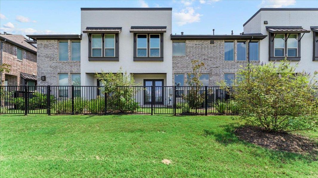 Rear view of house with brick siding Rear view of house with brick siding