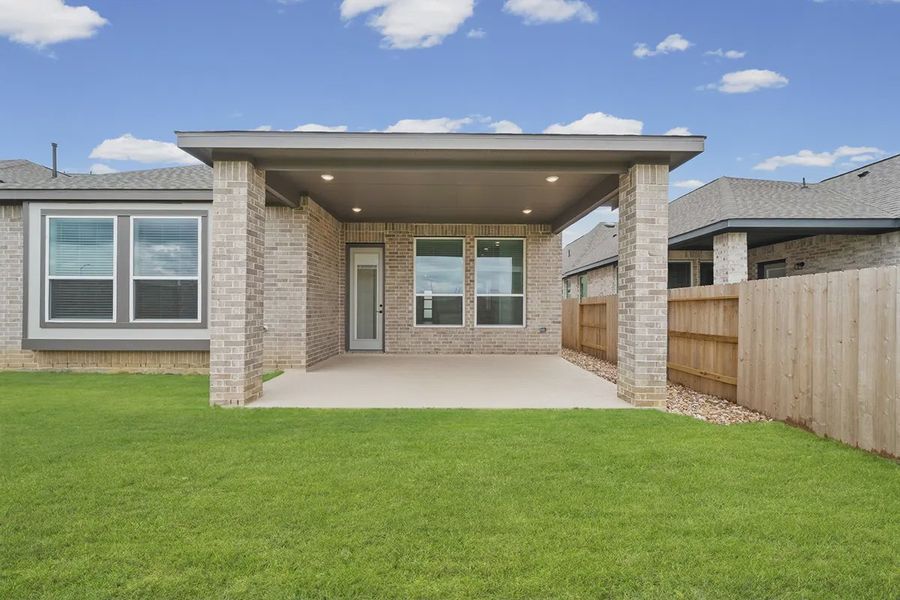 Exterior details and patio area of a home in Wildrye 45', Waller (Image 3). Exterior details and patio area of a home in Wildrye 45', Waller (Image 3).