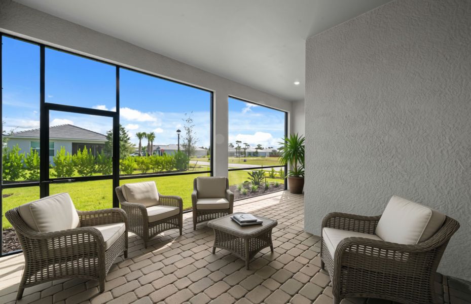 Exterior details and patio area of a home in Del Webb Oak Creek, North Fort Myers (Image 25).