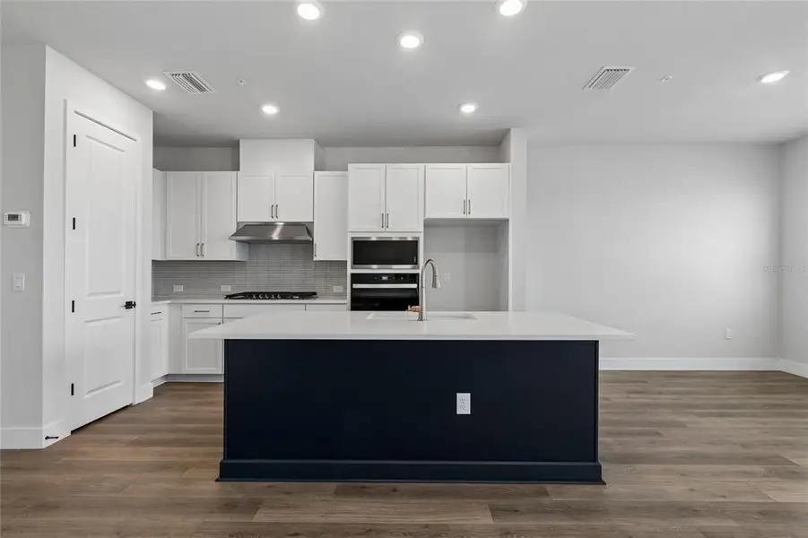 Furnished interior view inside a new home in , Sarasota (Image 12).