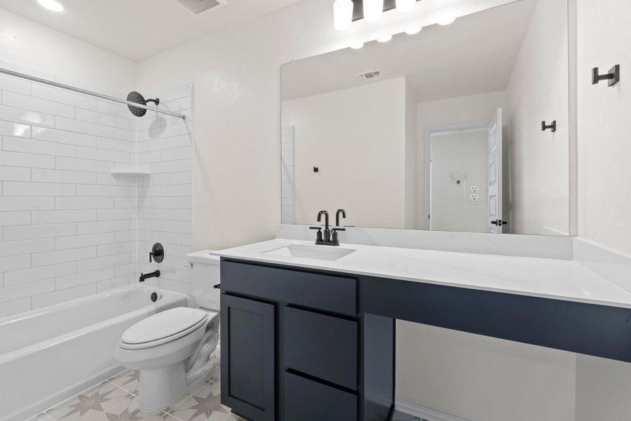 Furnished interior view inside a new home in Salerno - Classic Collection, Round Rock (Image 6). Furnished interior view inside a new home in Salerno - Classic Collection, Round Rock (Image 6).