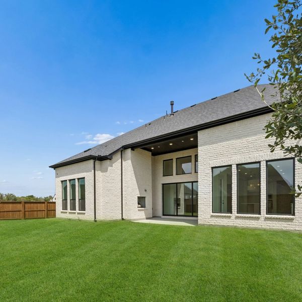 Exterior details and patio area of a home in The Parks at Wilson Creek, Celina (Image 32).