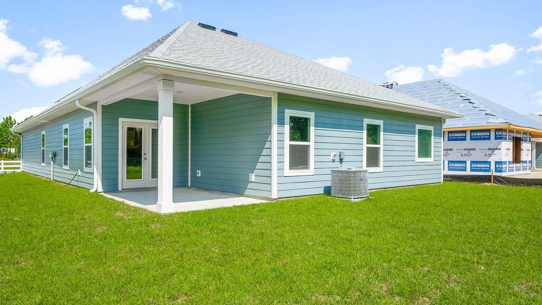 Representative exterior photo of a completed home built from the The Kennedy by D.R. Horton in Buffer Farms, Port Saint Joe, FL (Image 16).