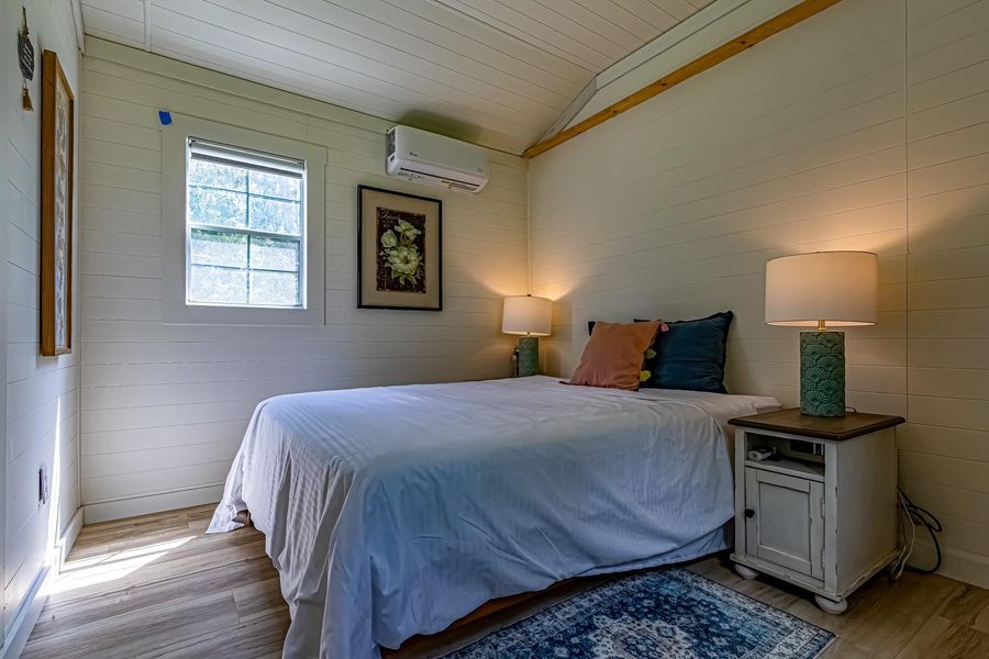 Primary bedroom. Nickle Gap Shiplap Panel throughout. Primary bedroom. Nickle Gap Shiplap Panel throughout.