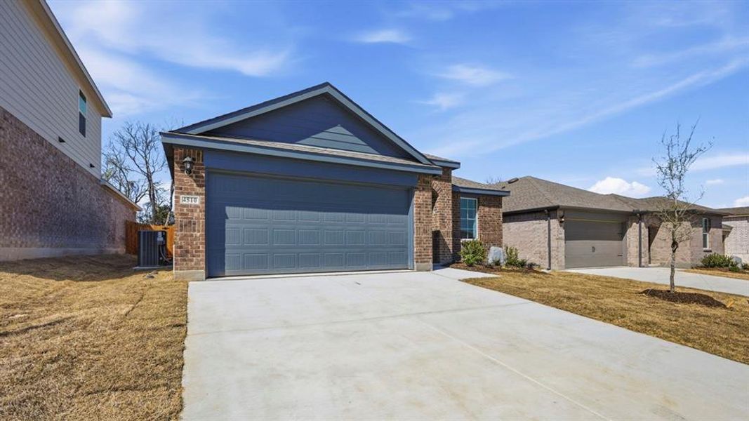 Front exterior of a new home in Sweetwater Springs, Sherman, TX, highlighting curb appeal (Image 25).