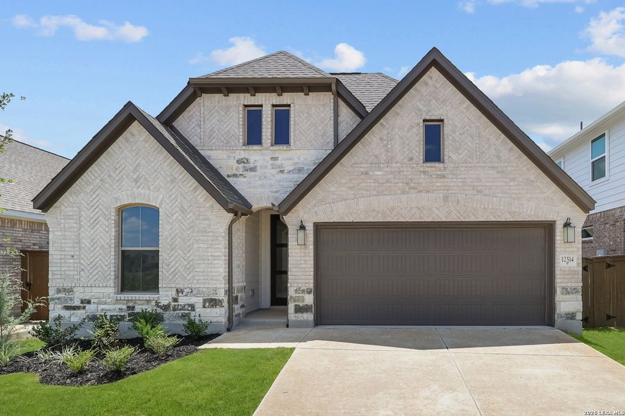 Front exterior of a new home in Stillwater Ranch, San Antonio, TX, highlighting curb appeal (Image 22).