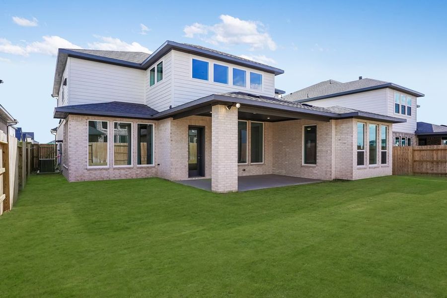 Exterior details and patio area of a home in Avalon at Cypress, Cypress (Image 3).
