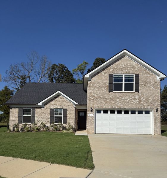 Front exterior of a new home in Bradley Bend, Ashland City, TN, highlighting curb appeal (Image 2).