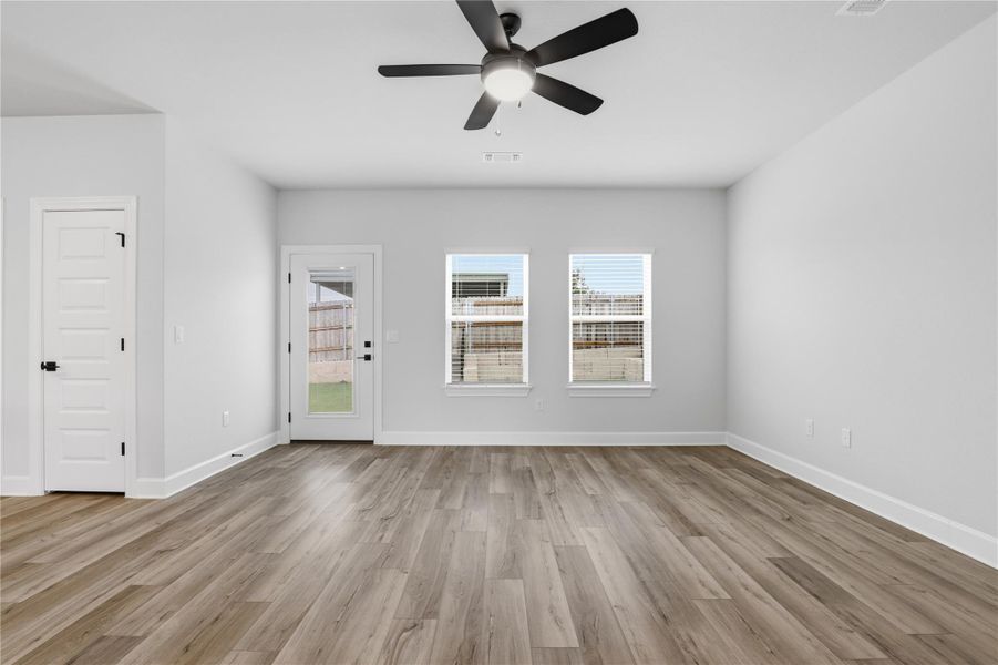 Spacious, unfurnished interior of a new home in Whisper Valley, Manor (Image 29).