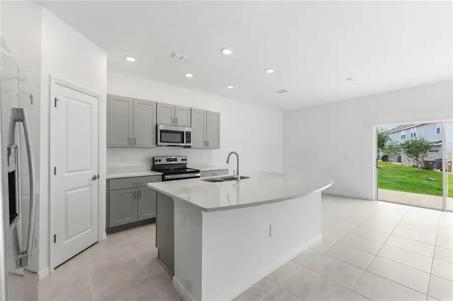 Furnished interior view inside a new home in , Kissimmee (Image 4).