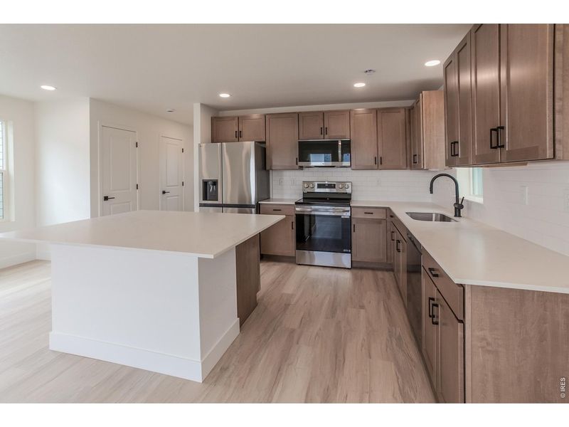 Furnished interior view inside a new home in Bloom Trailblazer Collection - Single Family Homes, Fort Collins (Image 28).
