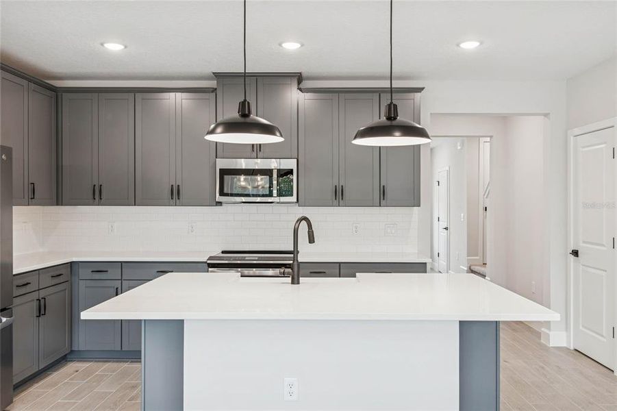 Furnished interior view inside a new home in Aspire at Canter Creek, Davenport (Image 6).