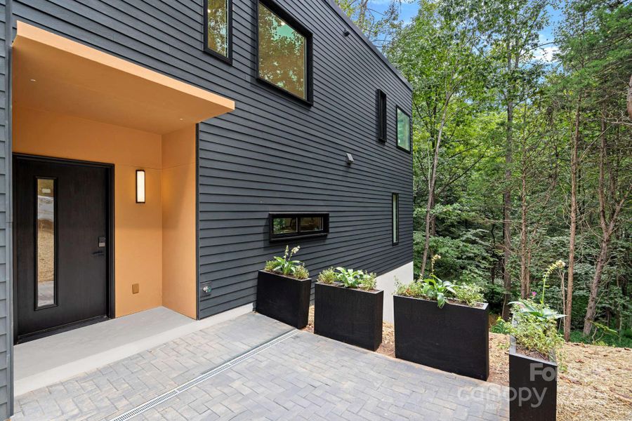 Front exterior of a new home in , Charlotte, NC, highlighting curb appeal (Image 24).