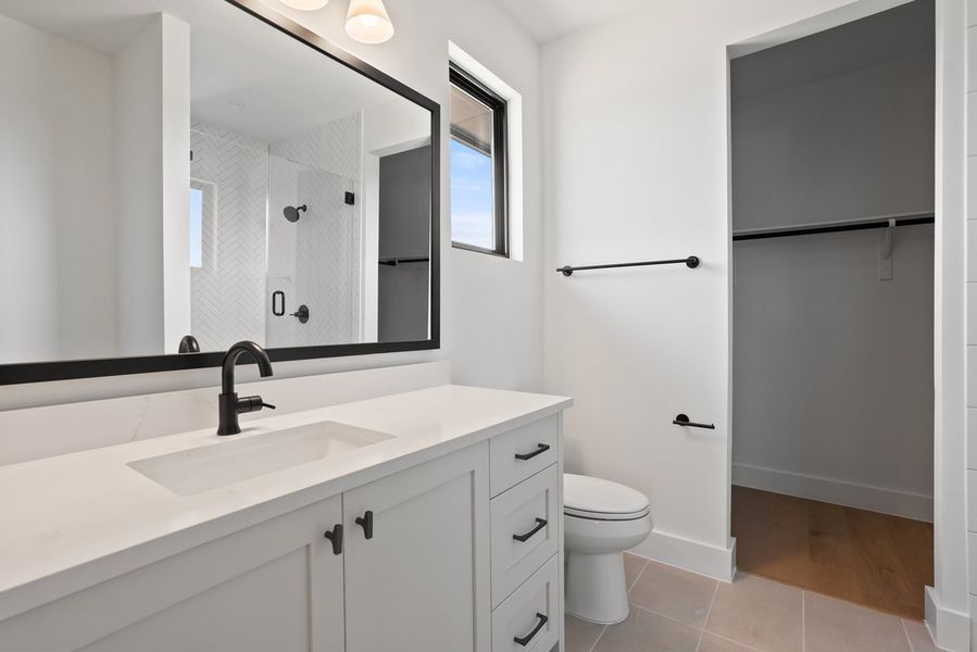 Furnished interior view inside a new home in Milky Way at River Place, Austin (Image 11).