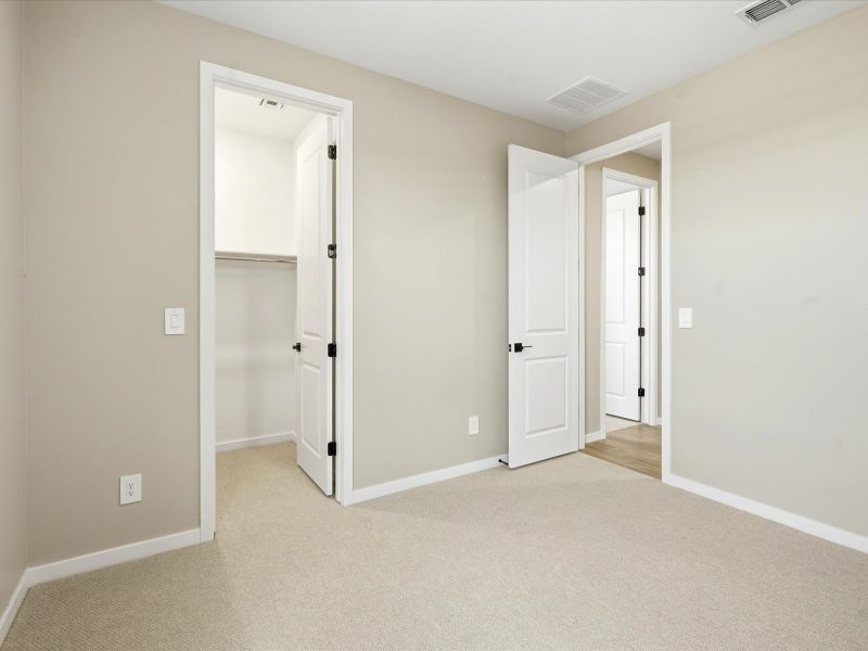 Spacious, unfurnished interior of a new home in Blossom Rock Signature Series, Apache Junction (Image 14).