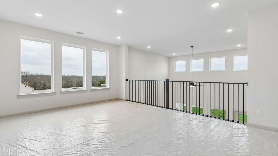 Representative unfurnished interior of a home built from the Toulouse II by Normandy Homes in Rainwater Crossing, Celina (Image 16).