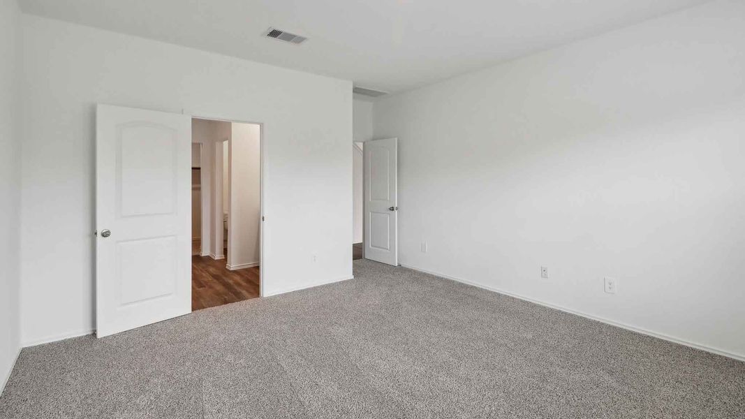 Spacious, unfurnished interior of a new home in Grand Pines, Magnolia (Image 19).