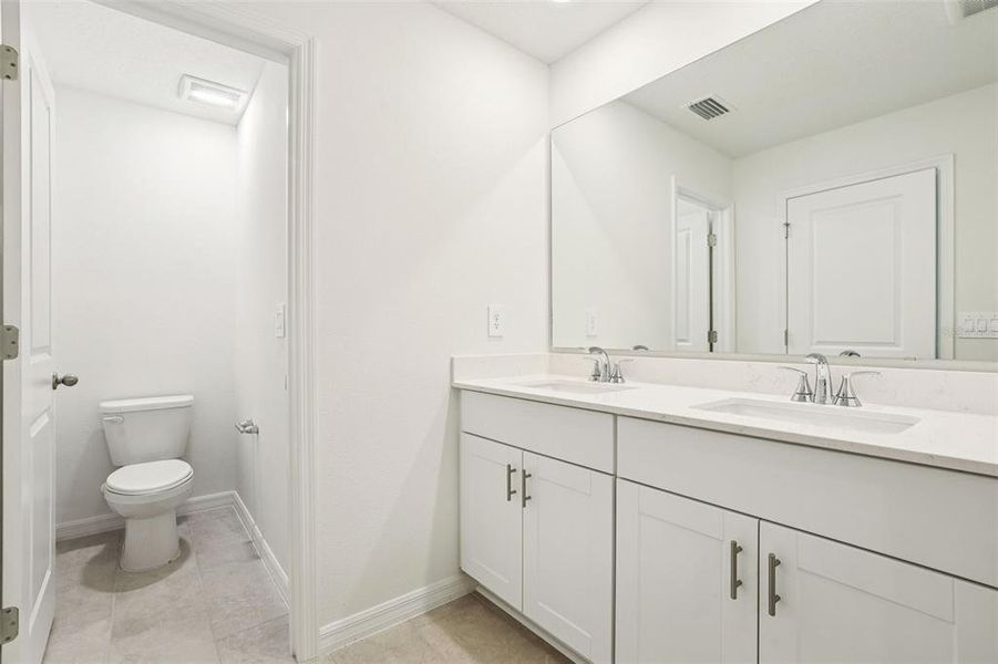 Furnished interior view inside a new home in Bradford Park, Ormond Beach (Image 11).