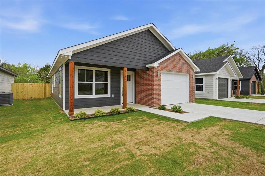 Front exterior of a new home in , Sherman, TX, highlighting curb appeal (Image 17).