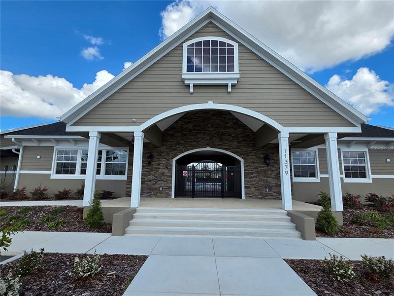 Front exterior of a new home in Waterford, Brooksville, FL, highlighting curb appeal (Image 21).