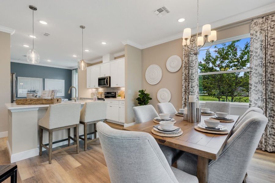 Representative furnished interior of a home built from the Biscayne by Holiday Builders in Pineapple Grove, Port St. Lucie (Image 5).