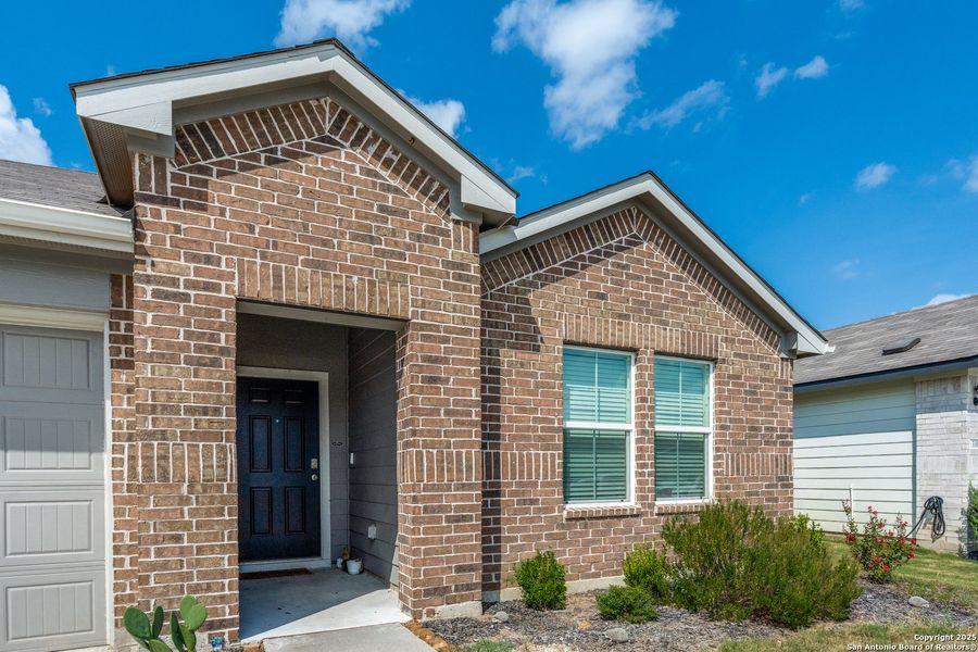 Front exterior of a new home in Heather Glen, New Braunfels, TX, highlighting curb appeal (Image 21).