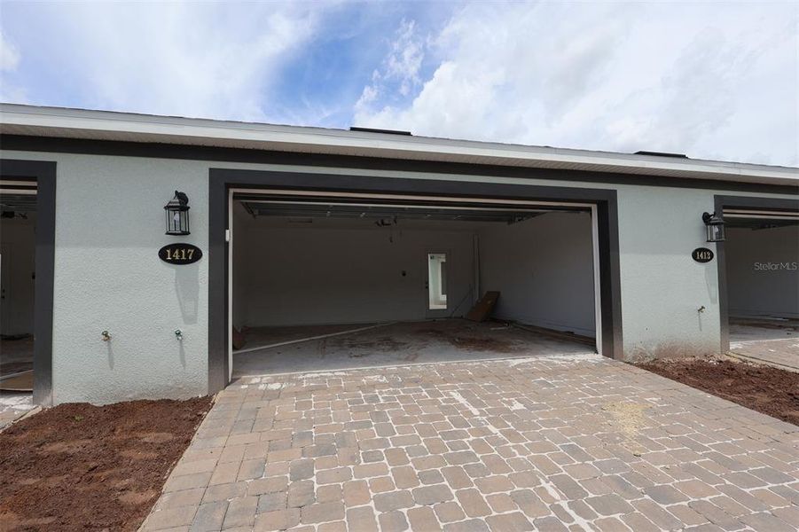 Exterior details and patio area of a home in Center Lake on the Park, St. Cloud (Image 3).