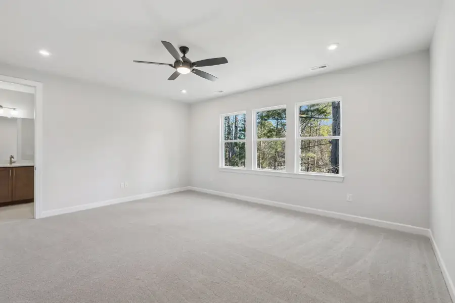 Spacious, unfurnished interior of a new home in The Townes at Willow Park, Cary (Image 9).